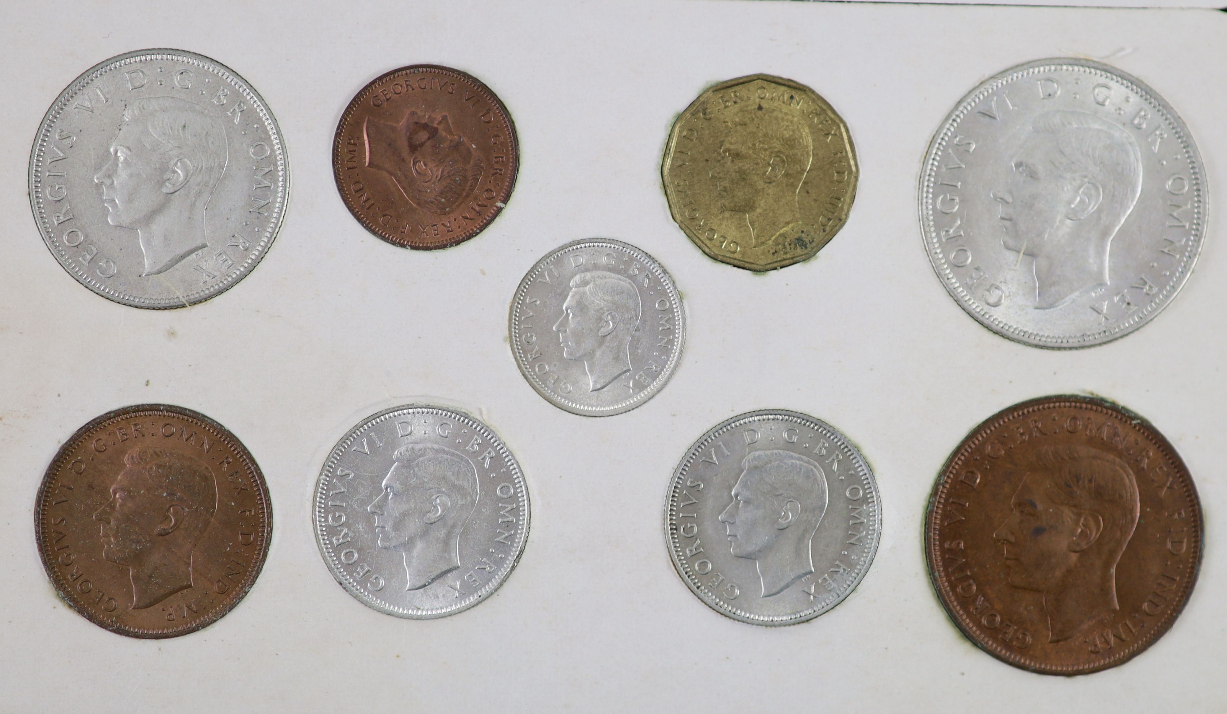 George VI specimen coin sets for 1944 and 1945, including the rare 1944 silver threepence, first coinage, all about EF or better
